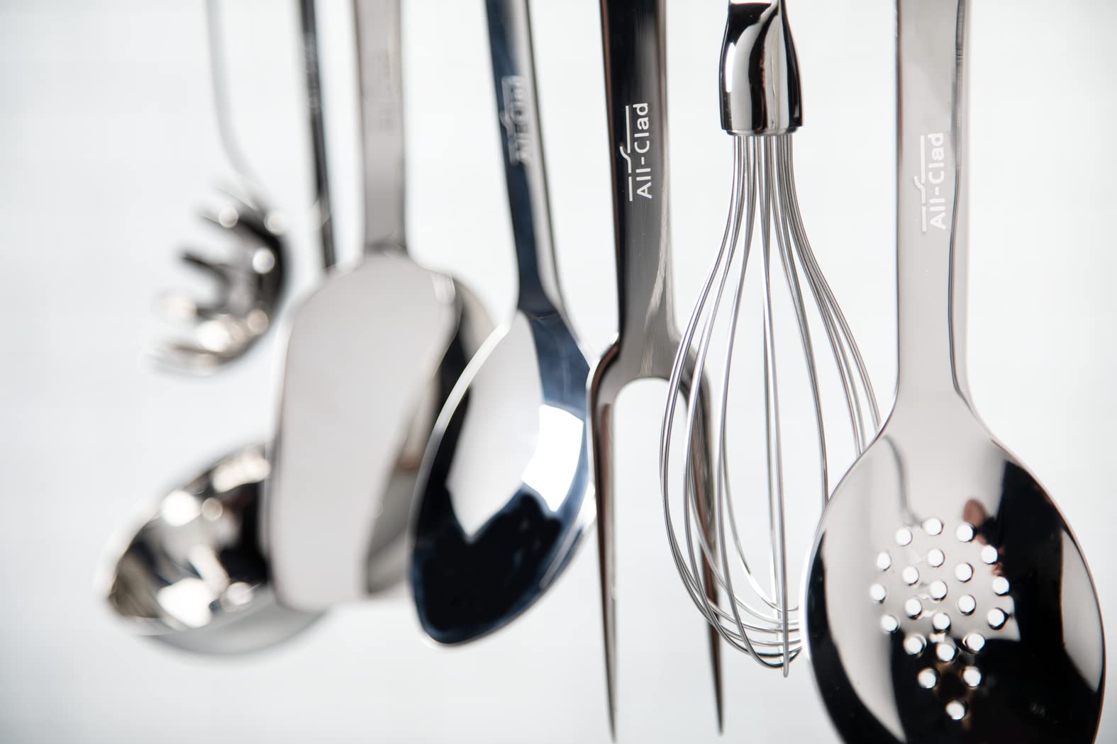 All-Clad slotted turner thin angled edge slides under delicate foods gently
