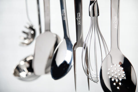 All-Clad slotted turner thin angled edge slides under delicate foods gently