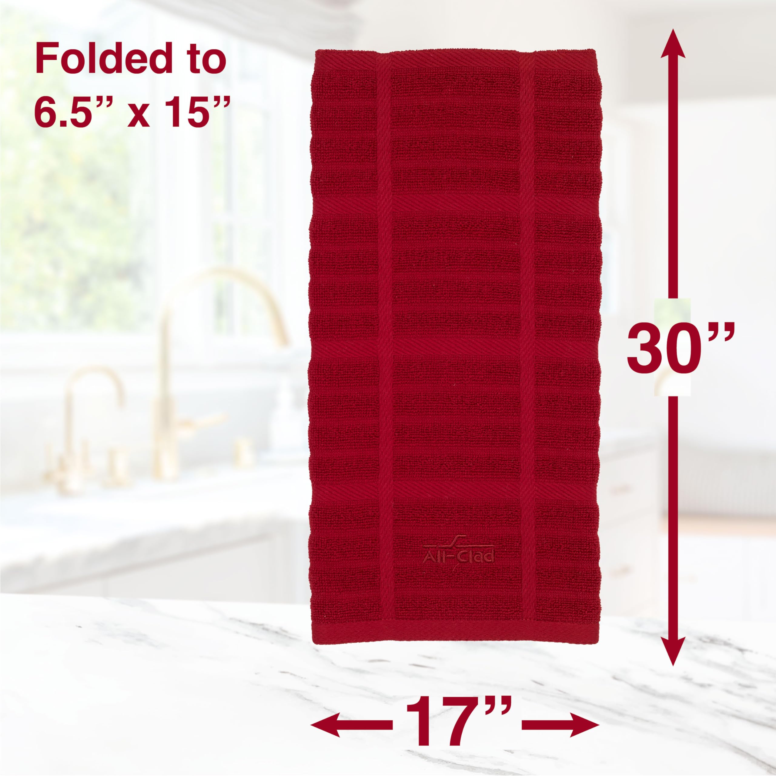All-Clad Solid Kitchen Towel delivers durable 100% cotton construction for daily use.