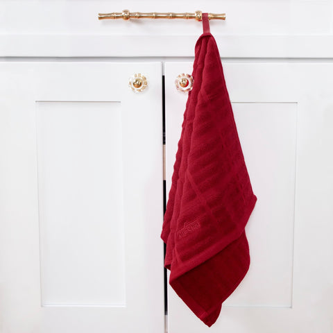 All-Clad Solid Kitchen Towel is machine washable for easy care.