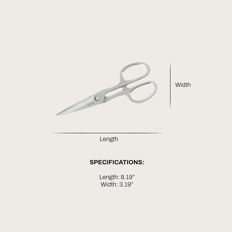All-Clad shears cutting poultry with ease for prep and breakdown.