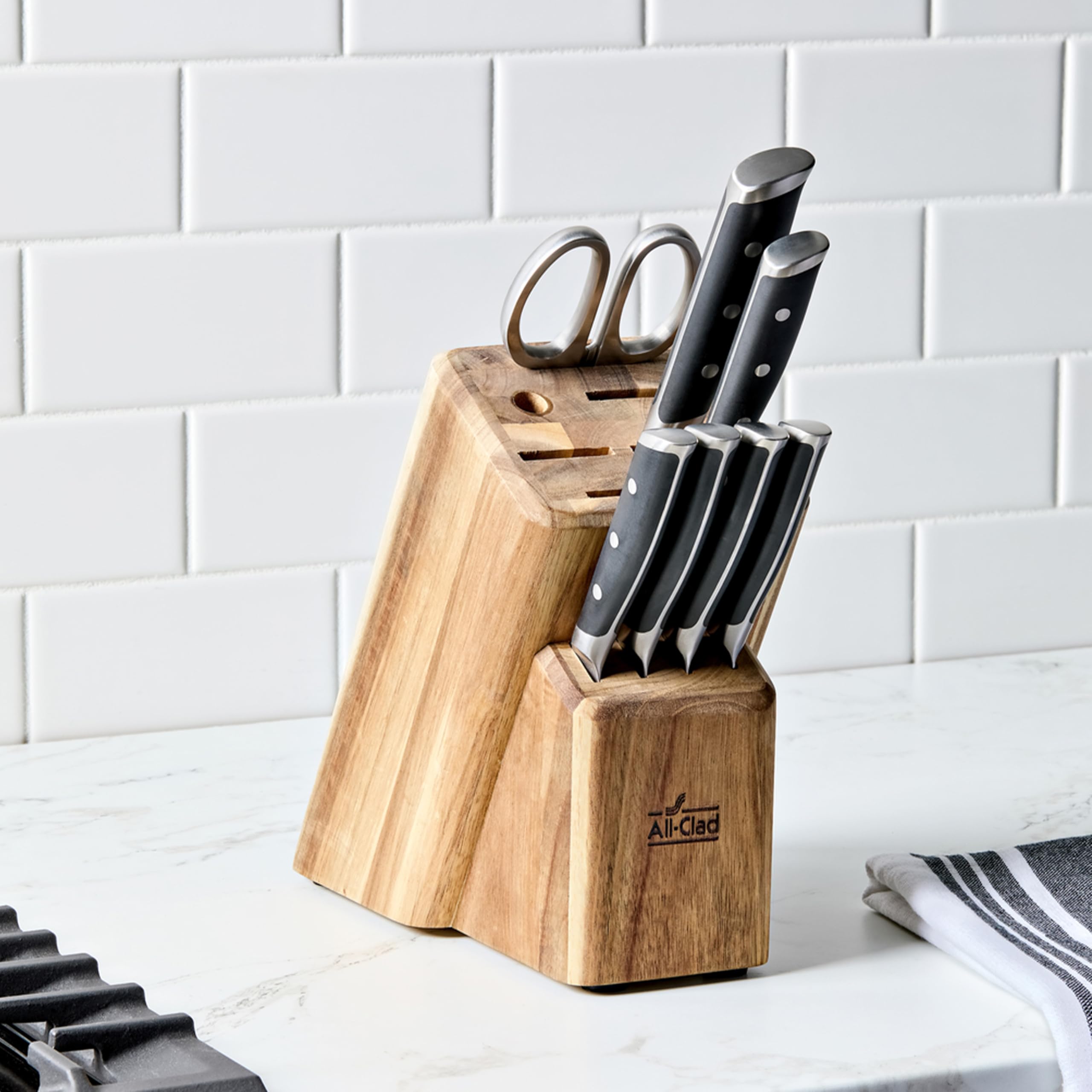 All-Clad kitchen shears offer rust-resistance and versatile cutting power.