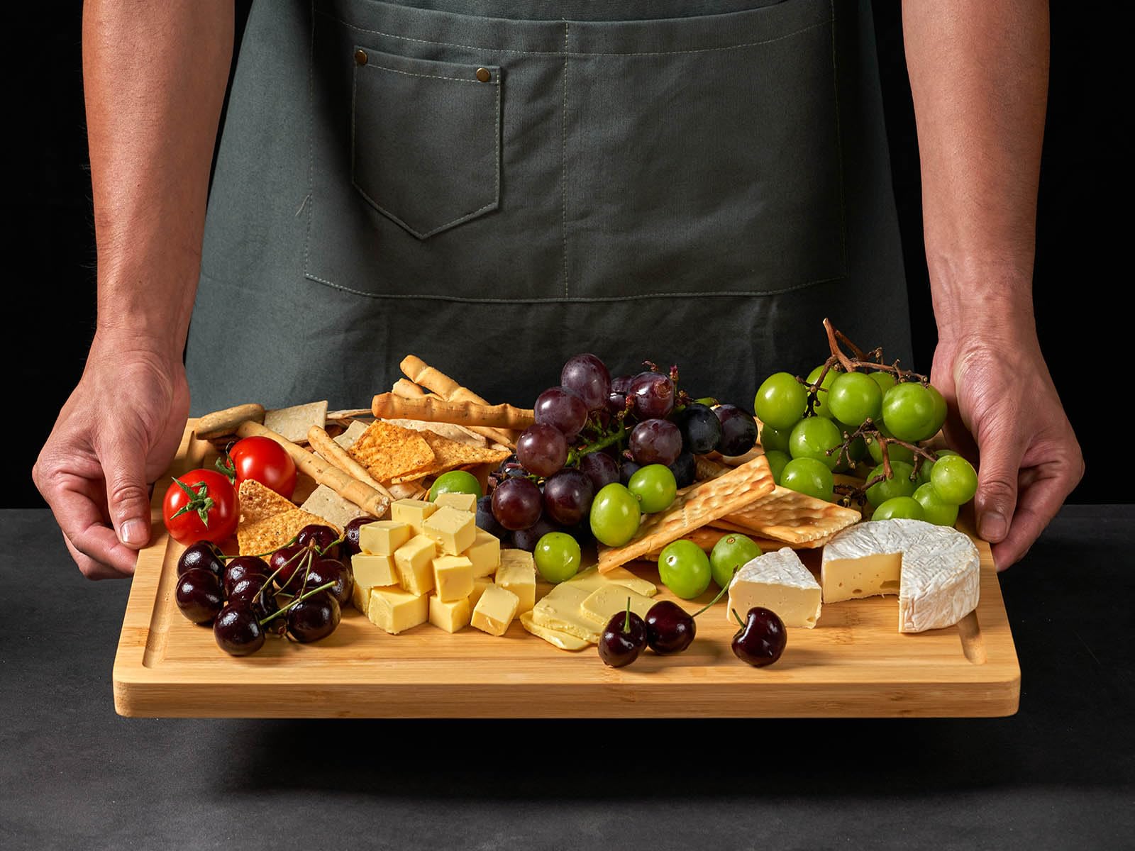 Allsum charcuterie cheese tray with side handles for easy serving at gatherings.