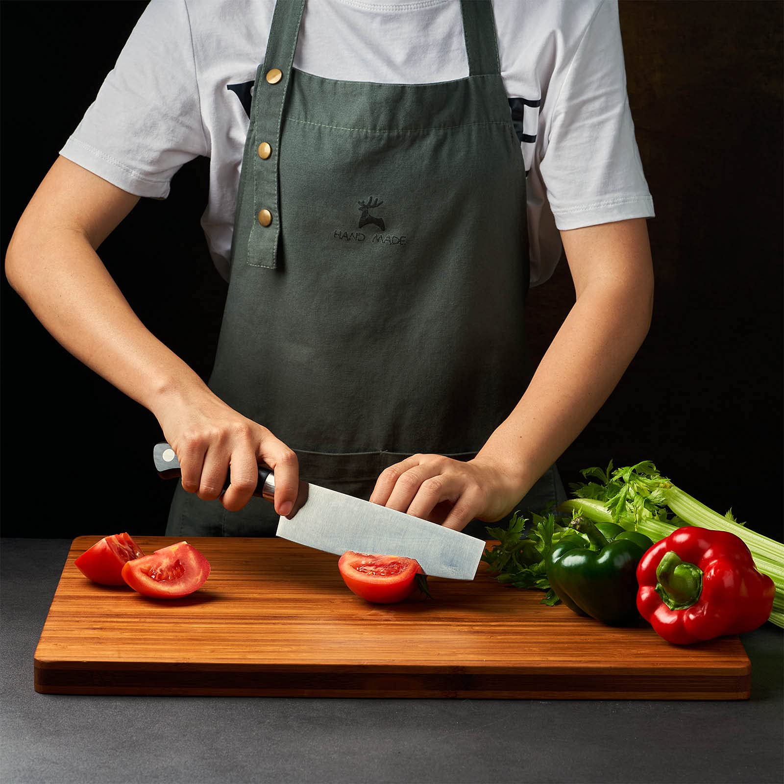 Allsum cutting board side-handles in use for easy serving