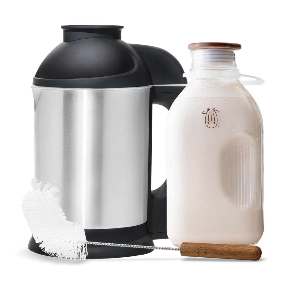 Almond Cow Nut Milk Maker on the counter for fresh plant-based milk.