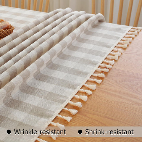 Alsoo Checkered Tablecloth on a dining table set for meals.