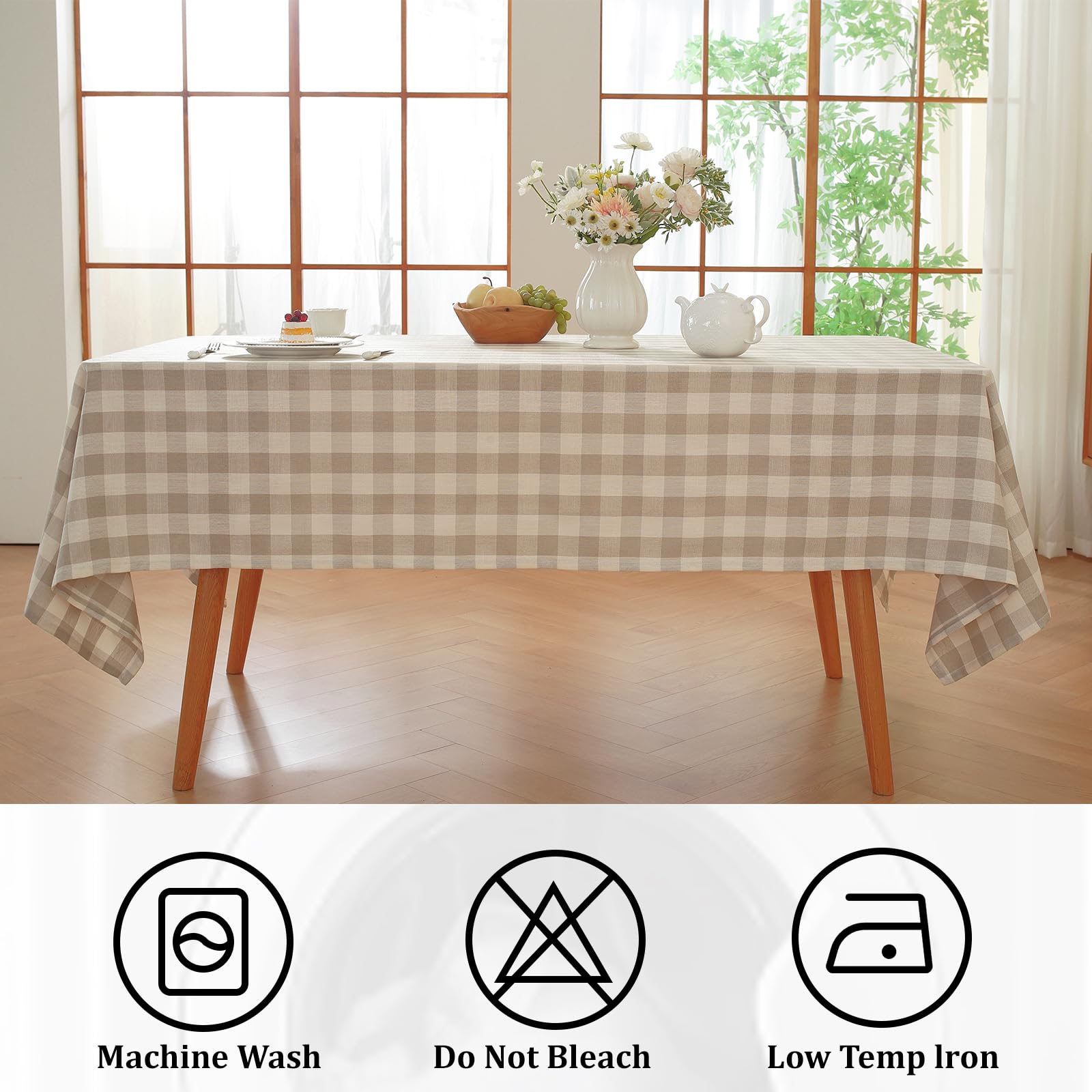 Alsoo plaid tablecloth draped over a rectangle table for elegant everyday meals