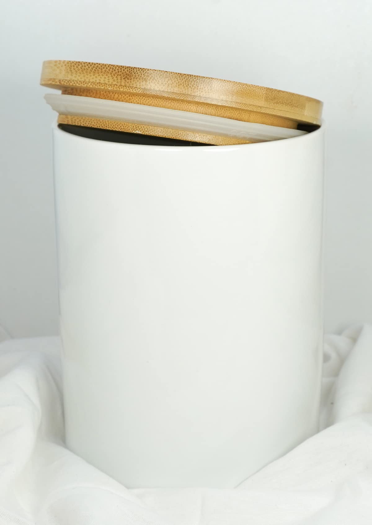 ALYC airtight storage canister on the counter keeps dry ingredients ready.