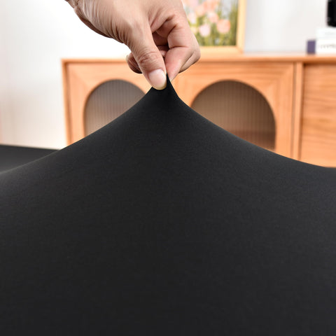 Amonsa black tablecloth in washable poly-spandex for easy care at events.