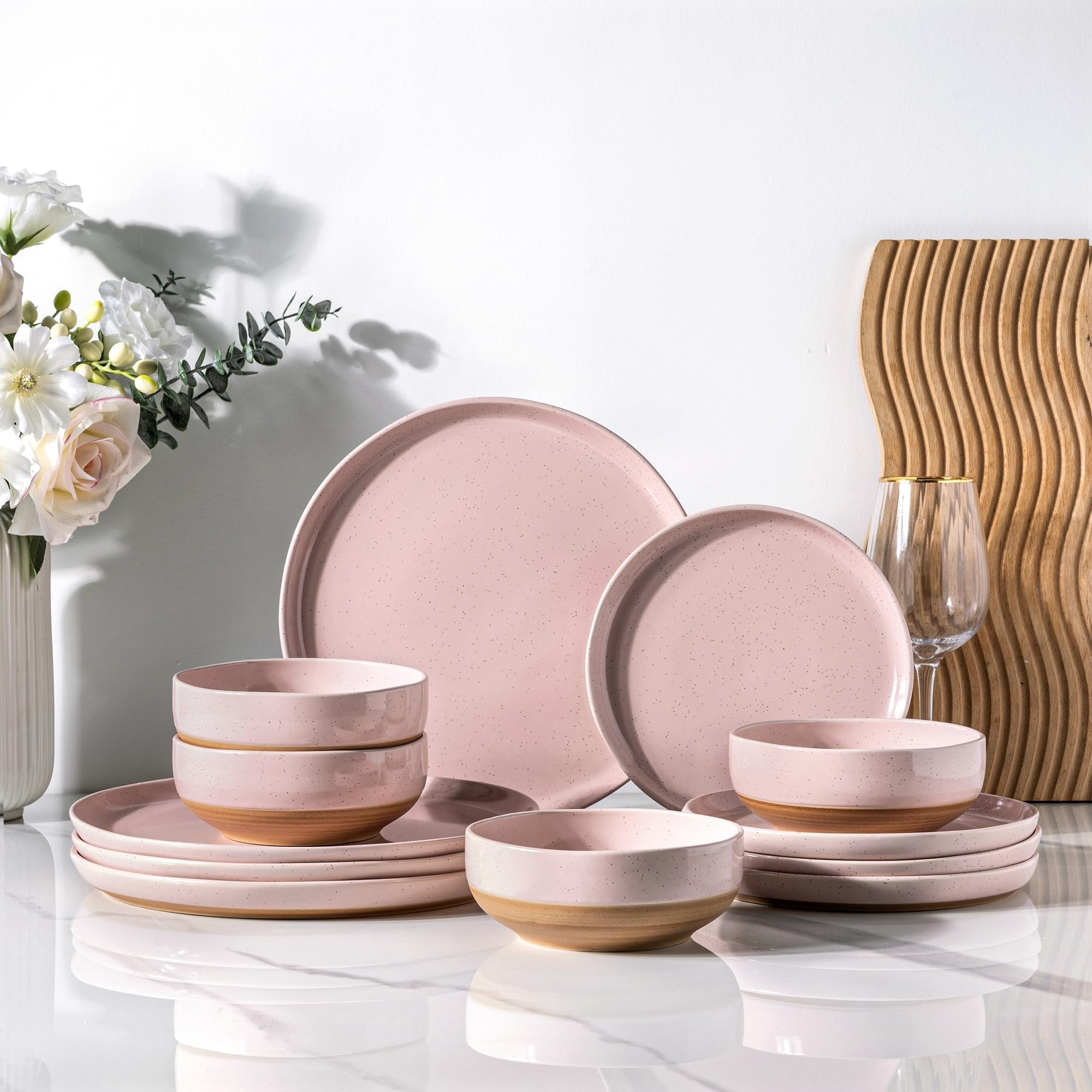 AmorArc 12-piece cloud pink dinnerware set for four on a table, ideal for family meals.