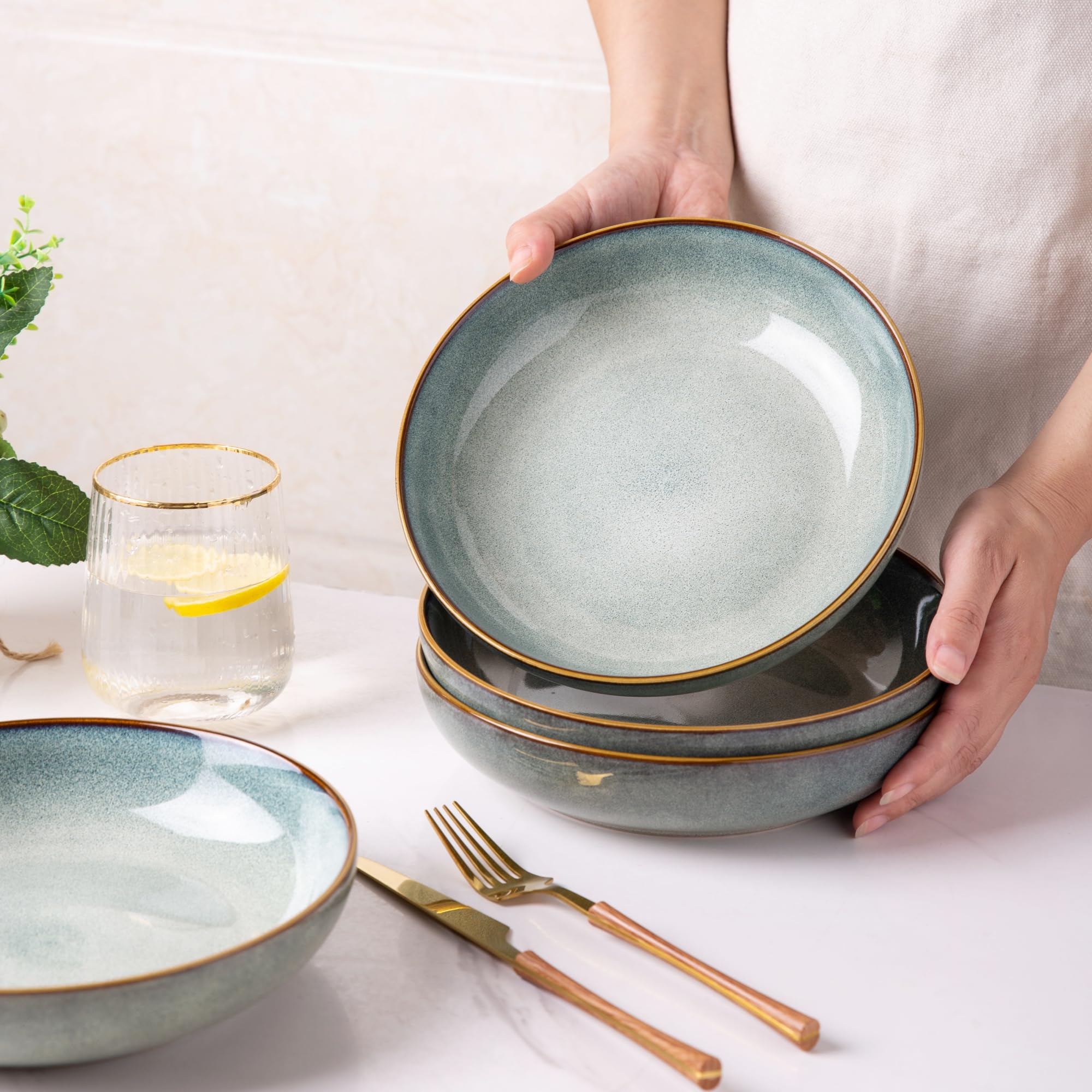 AmorArc tabletop dining display featuring ocean glaze bowls