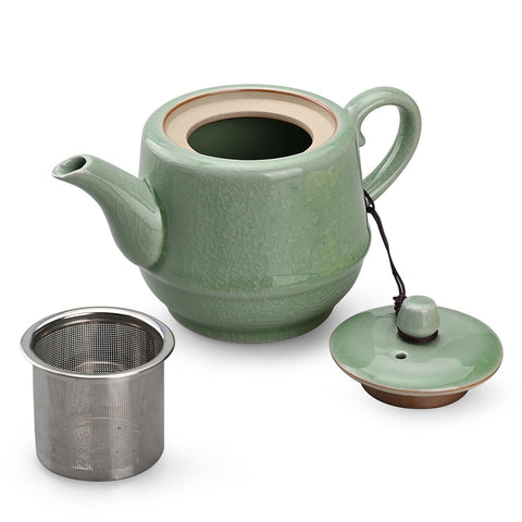 Amoysanli ceramic teapot in pink cyan exterior for elegant brewing.
