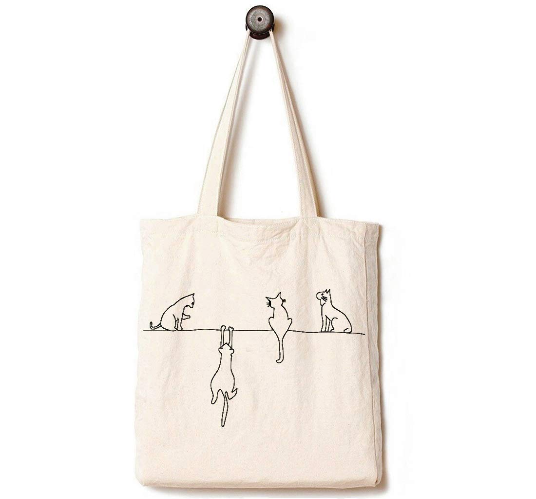 Andes four cats print tote front showcases playful design while carrying daily essentials.