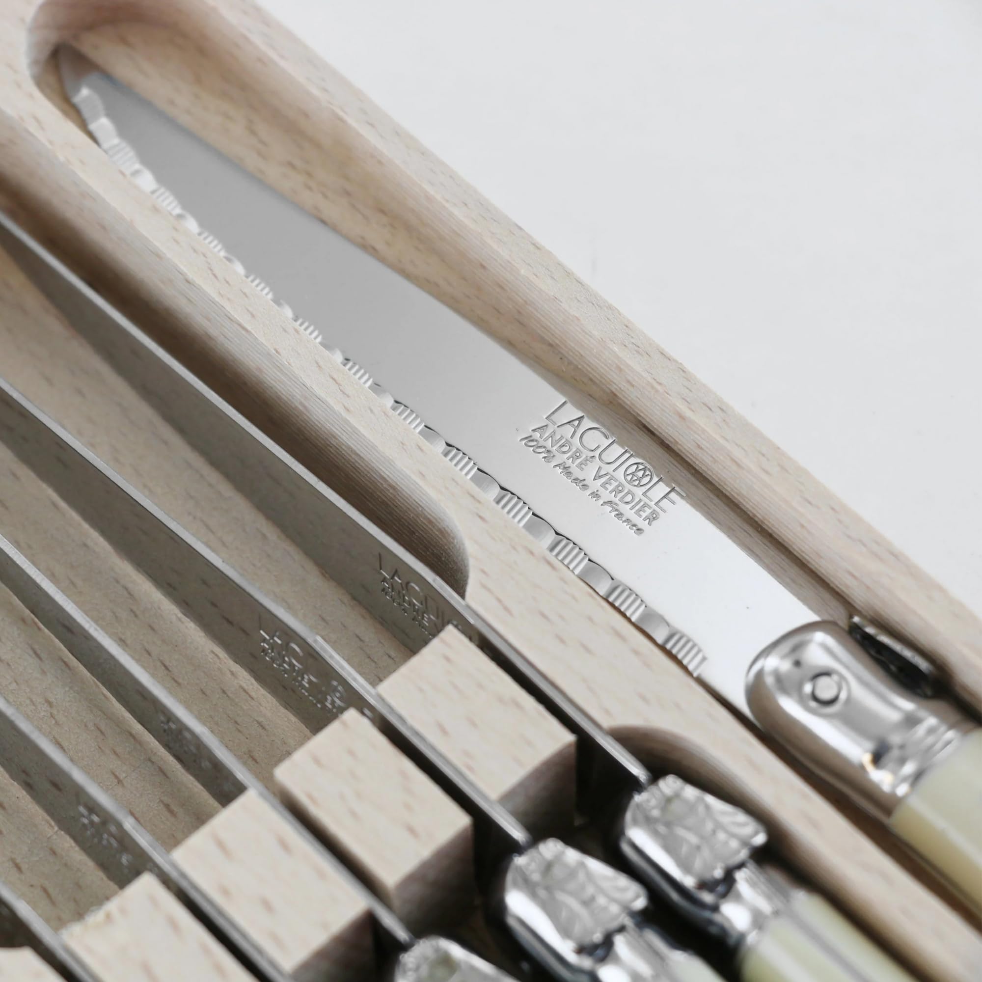 Andre Verdier ivory handle adds a striking, color-coordinated dinnerware look.