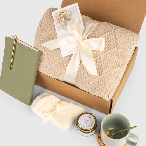Anforsun gift set includes coaster, spoon, notebook and pen.