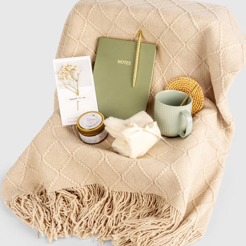 Anforsun scented candle to create a calm self-care ambiance.