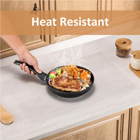 Angadona easy-clean silicone countertop mat wipes clean quickly.
