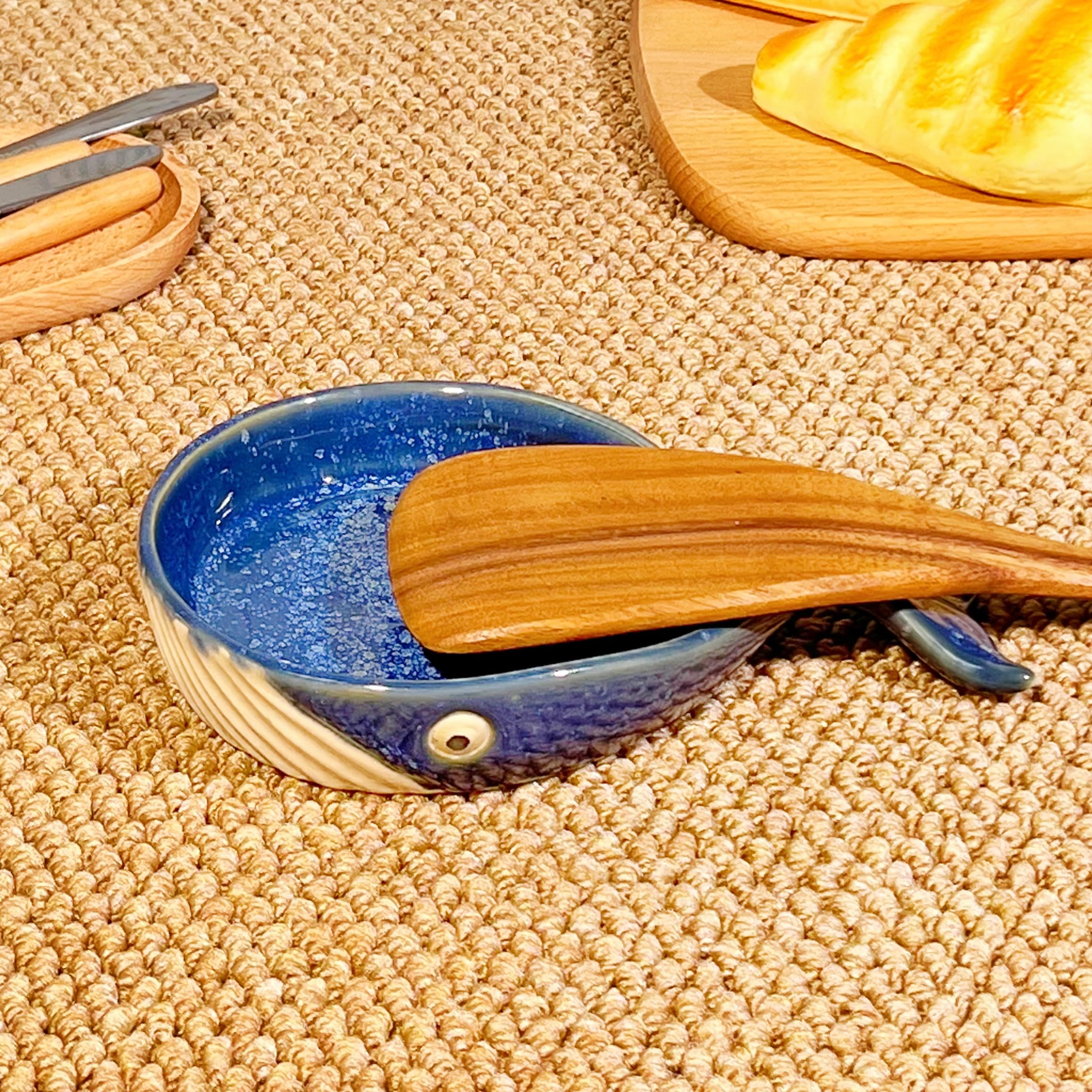 ANLYAWX ceramic whale spoon stand on a kitchen counter showing the whale design and tidy spoon rest use.