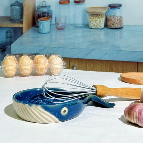 ANLYAWX whale spoon rest adds whimsical decor while catching drips on the countertop.