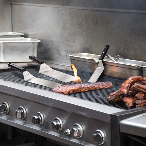 Anmarko spatula with beveled edge enables precise cutting on hot griddles.