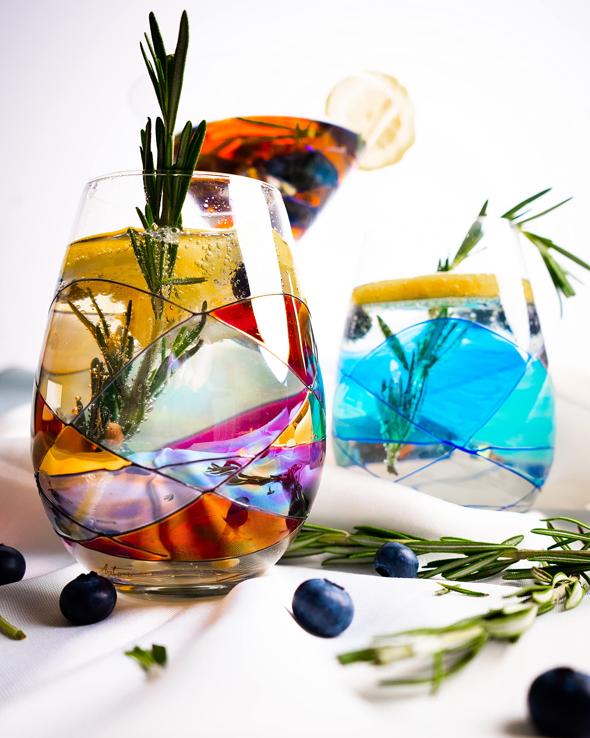 Antoni Barcelona hand-painted wine glass showcasing artisanal craftsmanship on a stylish table