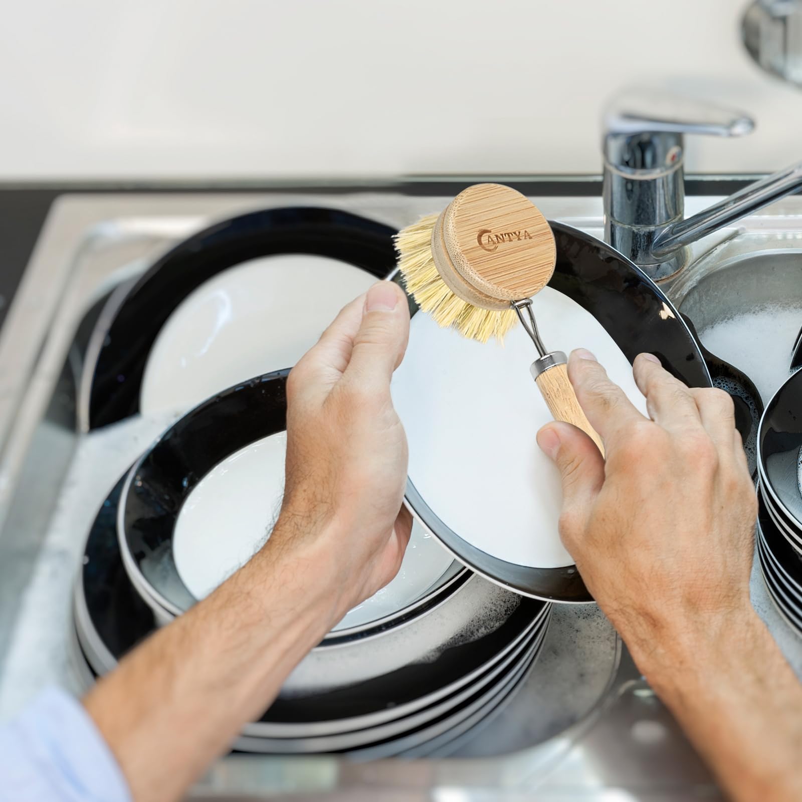 ANTYA bamboo dish brush on rustic countertop enhances kitchen aesthetics
