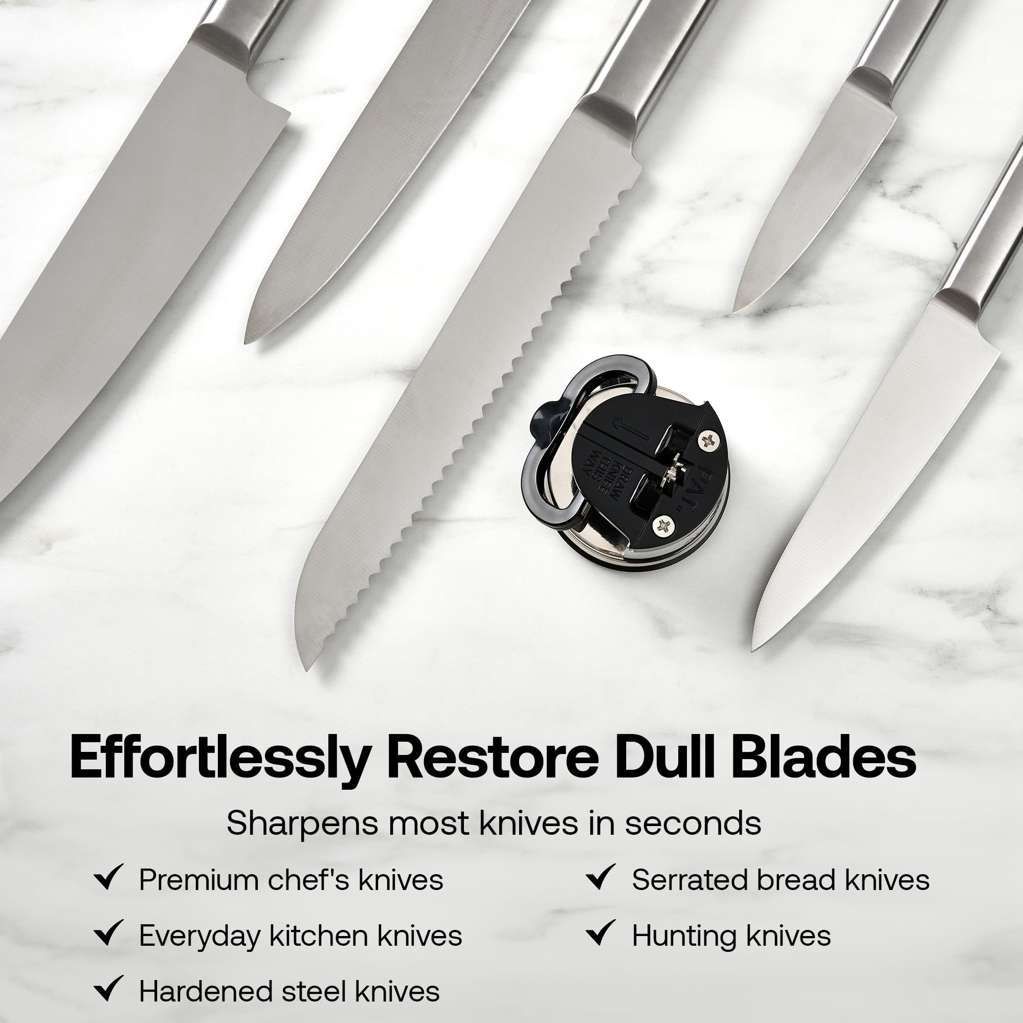 AnySharp Pro Metal Knife Sharpener close-up shows tungsten carbide tip for edge refinement.