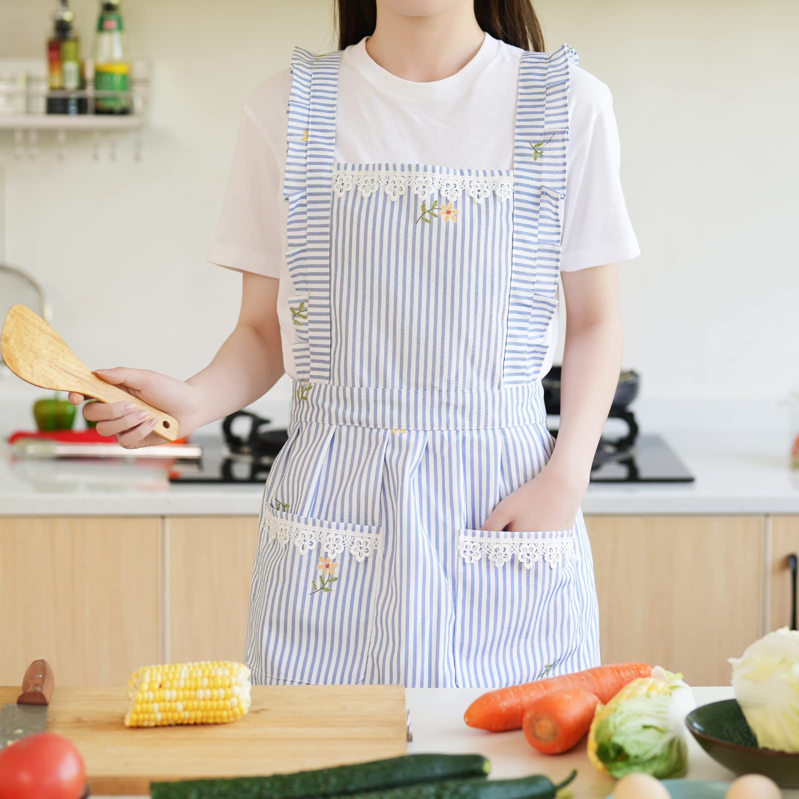 Aoomzoon apron blue stripe with pockets keeps utensils organized during prep.