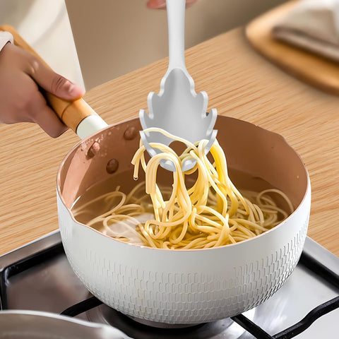 AOTHOD flexible spatula spreading sauce evenly during cooking.