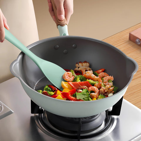 AOTHOD silicone egg whisk blends ingredients smoothly in a bowl.