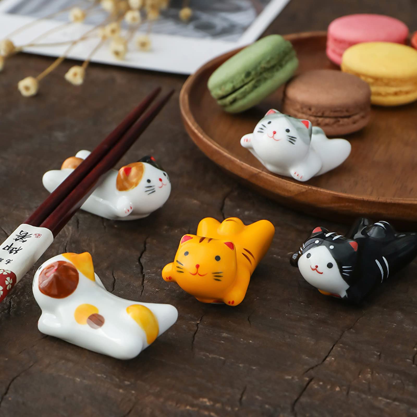 AP ARTSPER housewarming gift cat rests brighten any table.