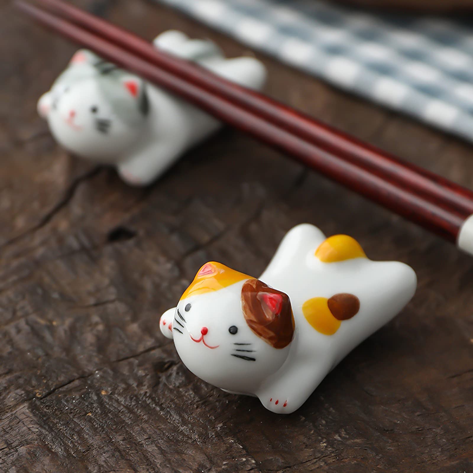 AP ARTSPER hand-painted cat rests add cute dining decor.