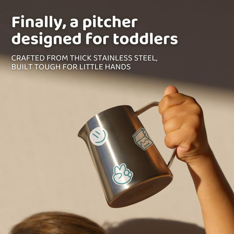 APLAINR mini stainless steel pitcher highlighted for easy child use.