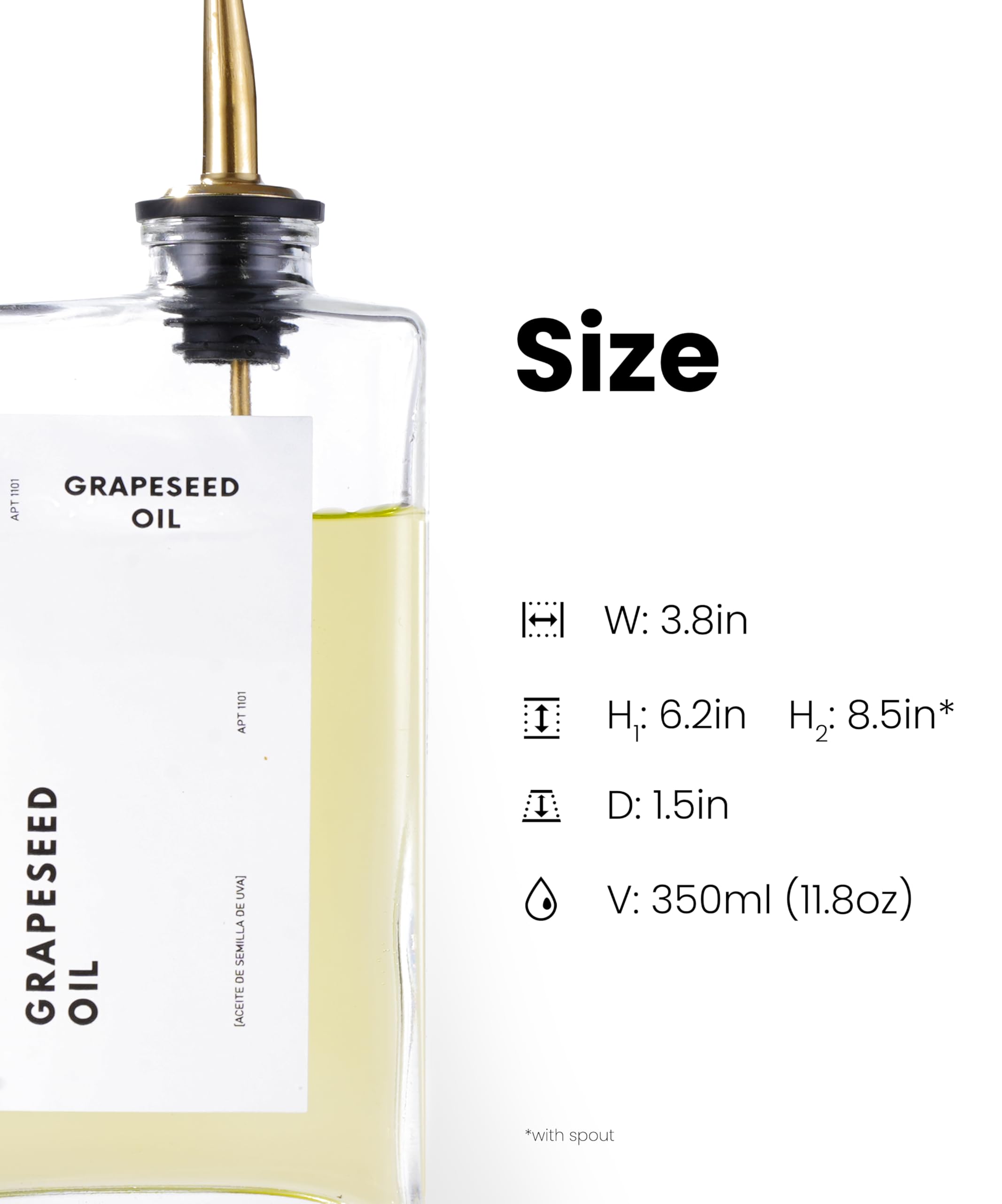 APT 1101 glass olive oil bottle with clear contents and gold accents.