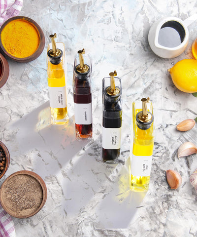 APT 1101 gift-ready oil dispenser set for culinary lovers.