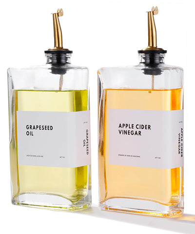 APT 1101 olive oil dispenser with gold finish and precise pour spout.