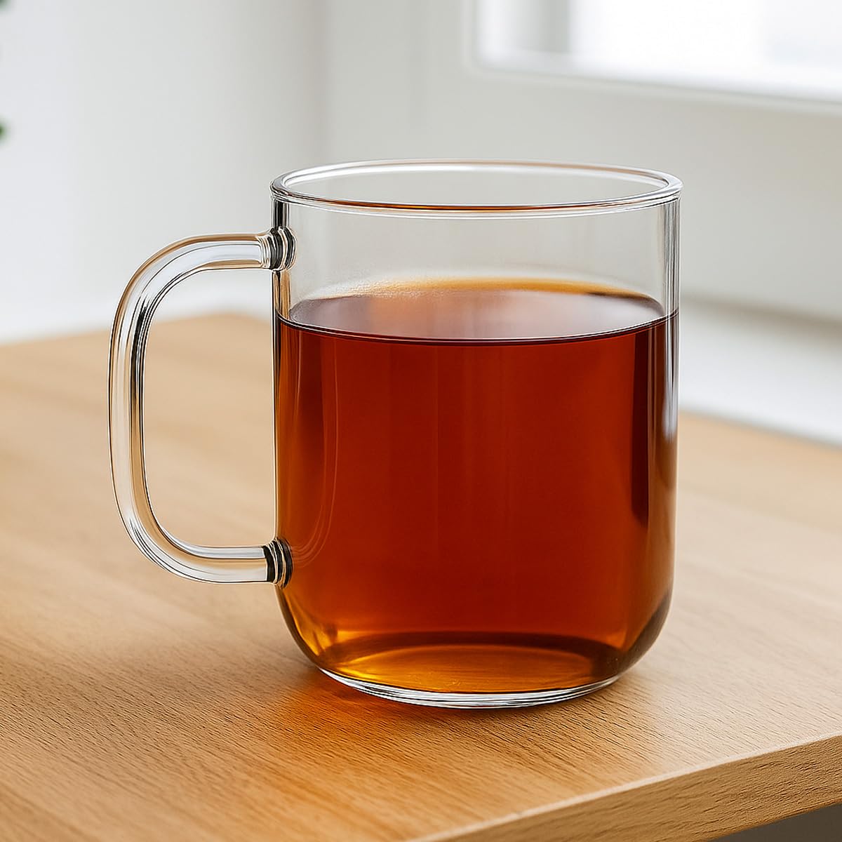 Aquach glass mug crystal-clear clarity highlights tea layers and cold beverages.