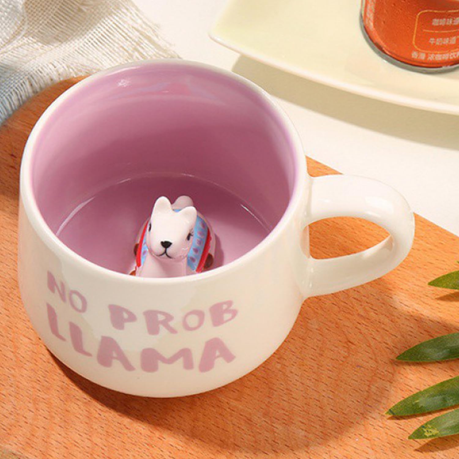 Shiny glaze and ceramic texture on the Arawat alpaca mug.