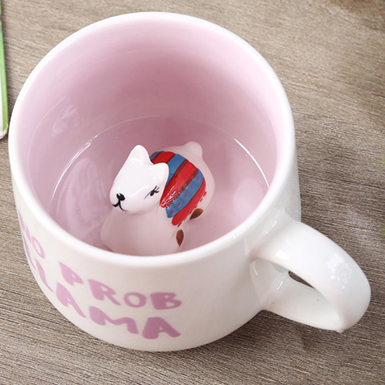 Mug displayed with a spoon and coaster for convenient serving.
