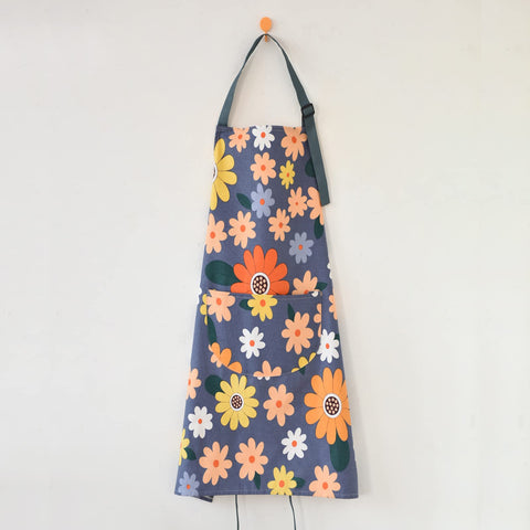ARBINSON floral apron blue waist belt worn front or back.