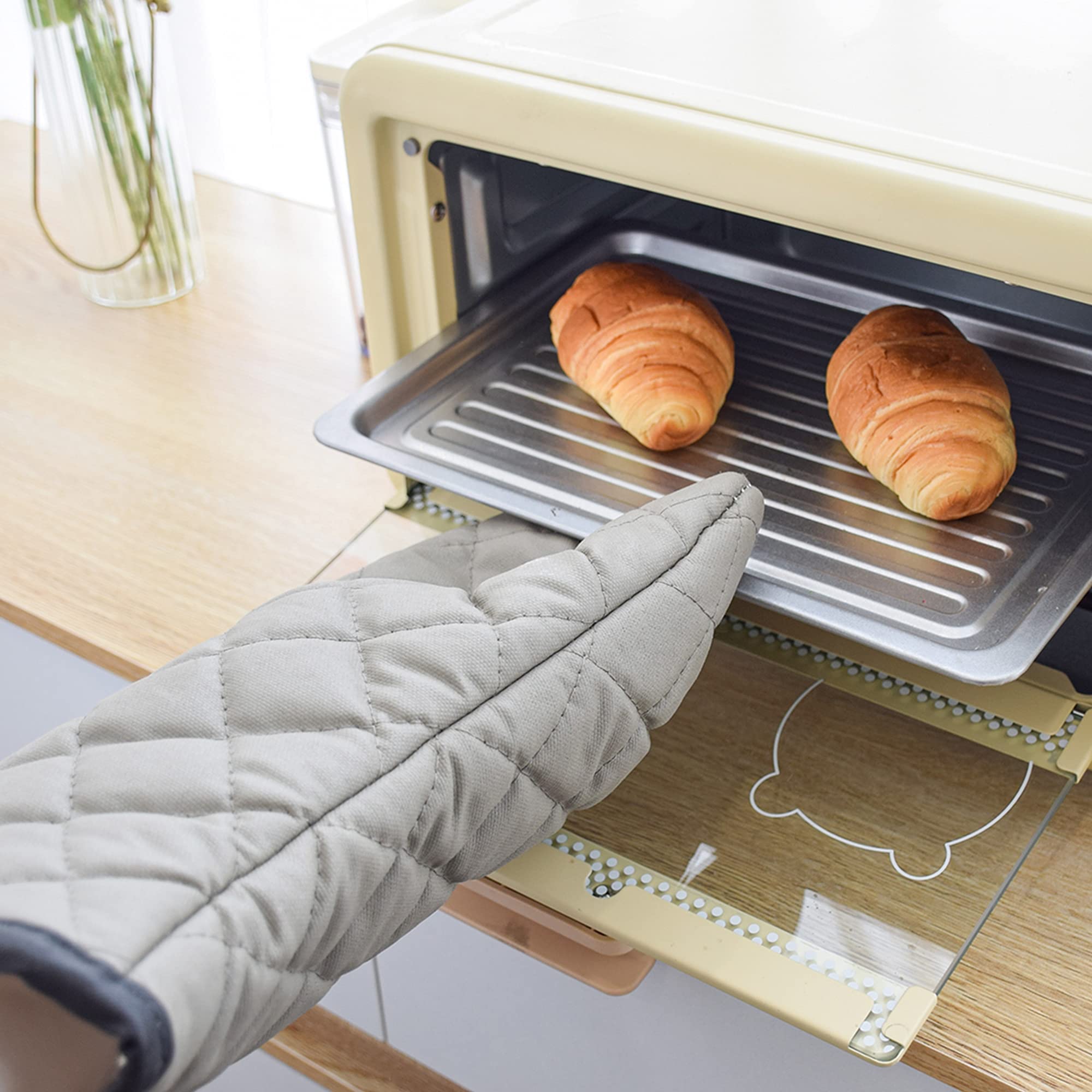 ARCLIBER oven mitts withstand up to 425°F for high-heat tasks.
