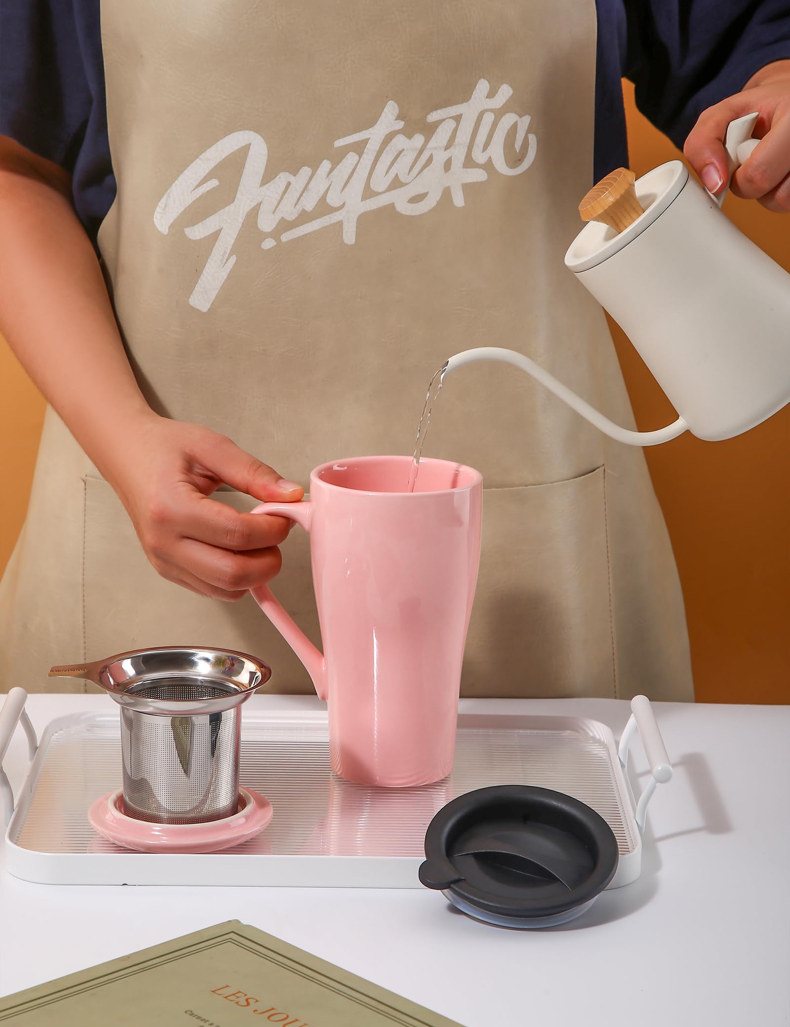 ARRADEN Tea Cup with handmade pink handle for a comfortable grip.