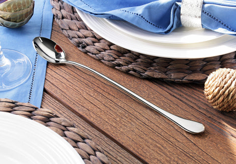 Artaste Rain dining room table setup with coordinated flatware.