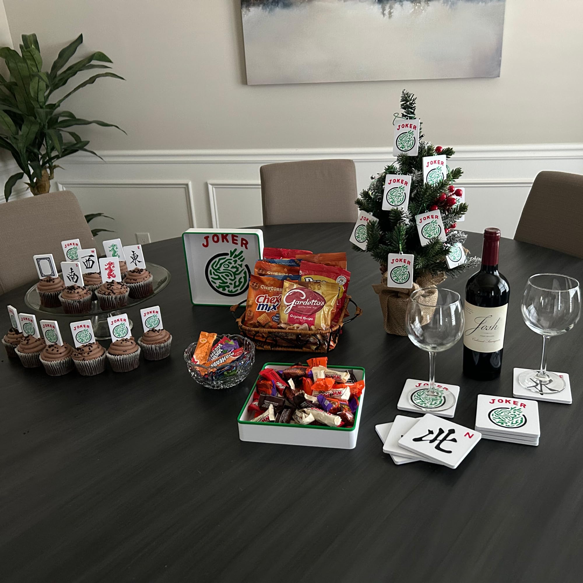 Artful 3D Mahjong coasters set on table; stylish game-night decor.