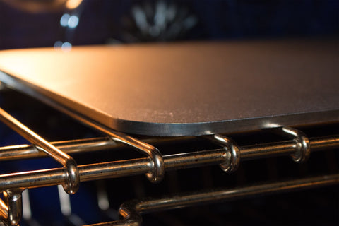 Artisan Steel pizza steel care guide image showing washing and seasoning.
