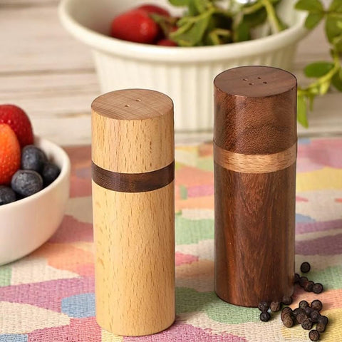 Artistic India rosewood pepper shaker adds rich color and durable performance at table.