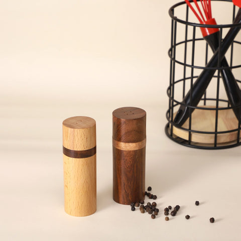 Artistic India tabletop presentation enhances dining with natural wood contrast.