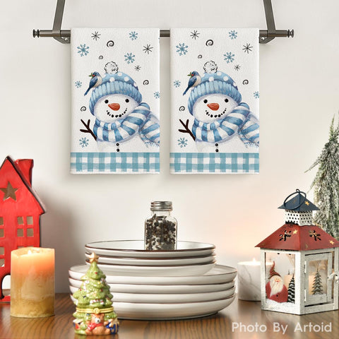 Artoid Mode 18x26-inch dish towels folded on dining table showcase absorbent, durable cleaning performance.
