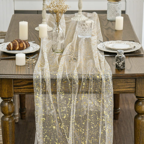 Beige gold gauze runner laid across a 120-inch table for elegant drape