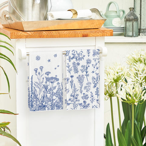 Artoid Mode blue antique herbs leaves towels draped on counter add charm and practicality.